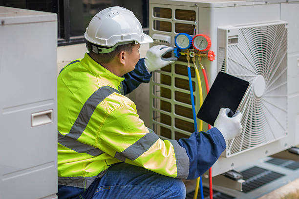 Professional Emergency Hvac Repair technician working in Caldwell, TX